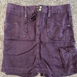 Purple skirt pockets, one side pocket and one back pocket